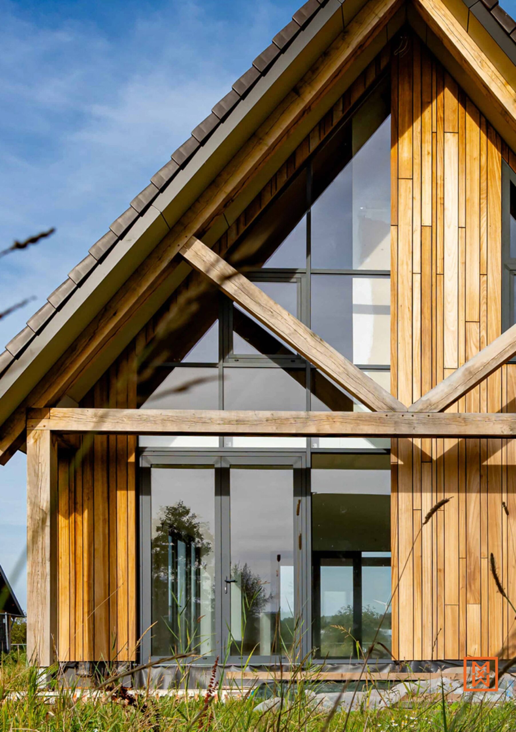 Stack of blueberry pancakes dusted with powdered sugar. Fresh blueberries top the pancakes. A delicious breakfast idea.